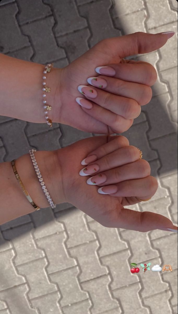 Sophisticated Nude Nail Design with Delicate White Tips and Minimalist Accents.