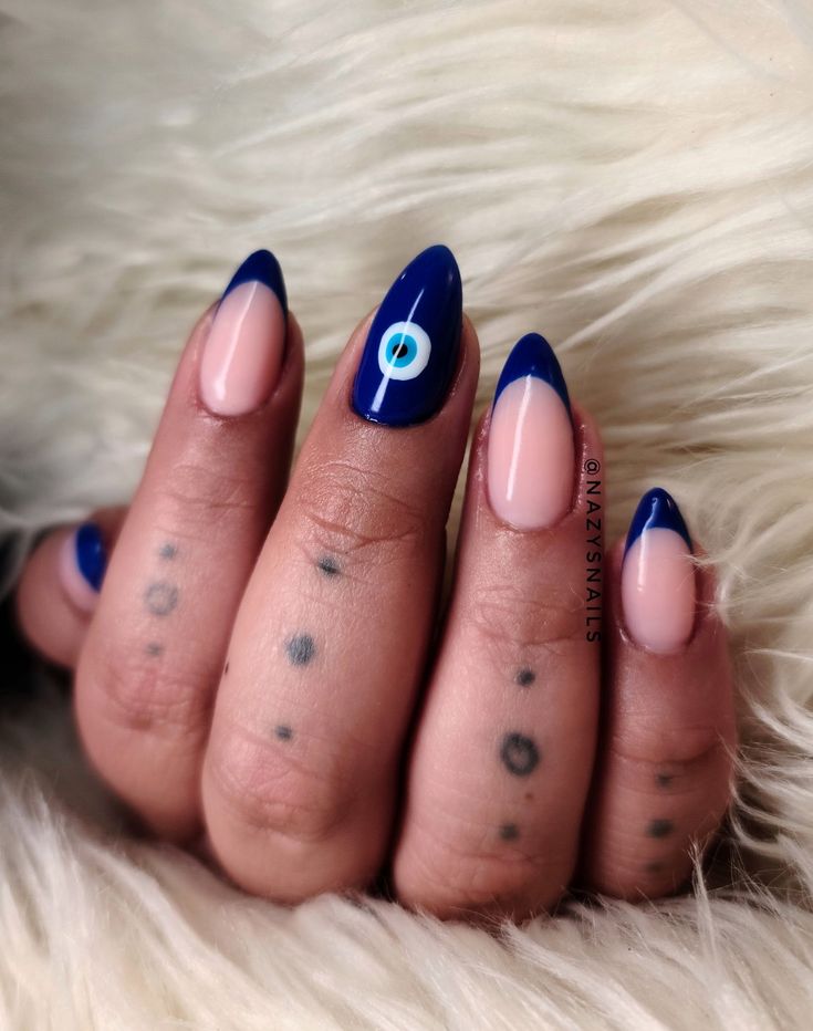 Bold Navy Blue and Nude Nail Design with Striking Contrast and Minimalist Accents.