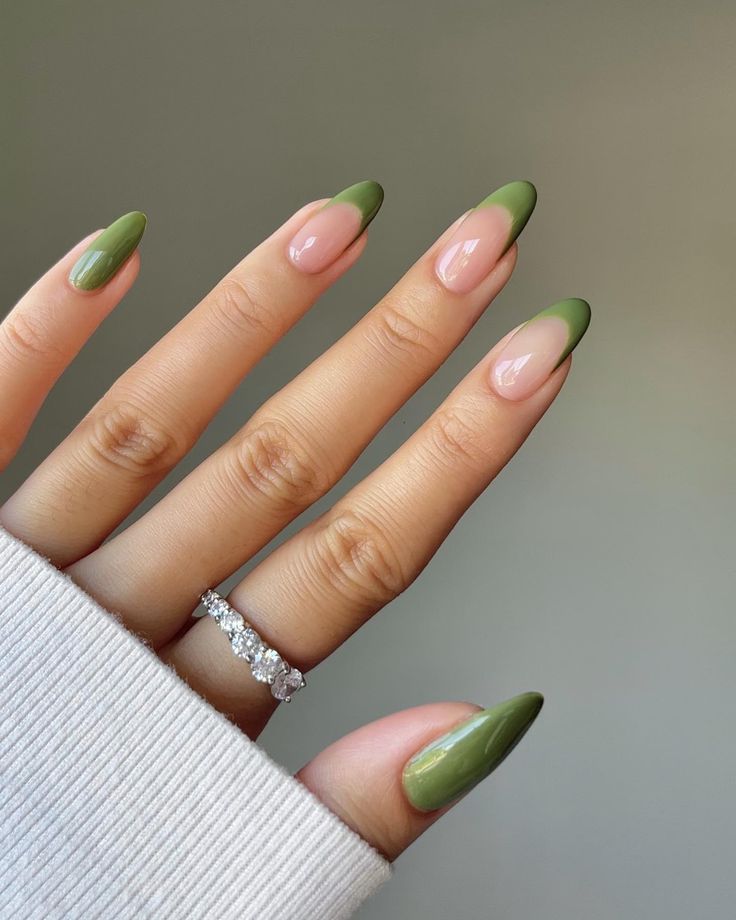 Sophisticated Almond-Shaped Nails with Soft Green Tips for a Modern Aesthetic.