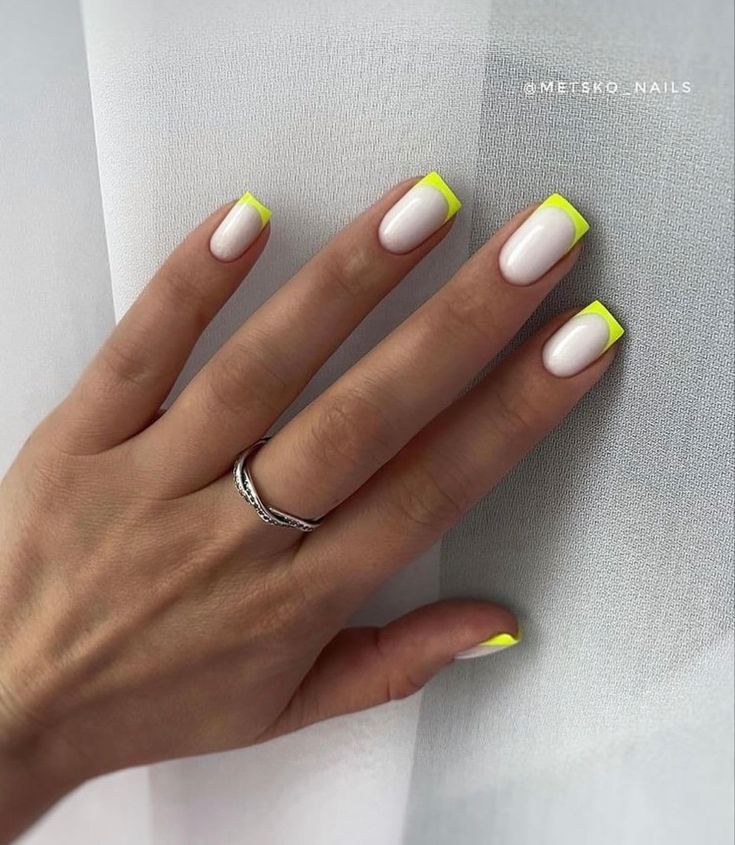 Modern Chic: Vibrant Neon Yellow Tips Revamp Classic French Manicure