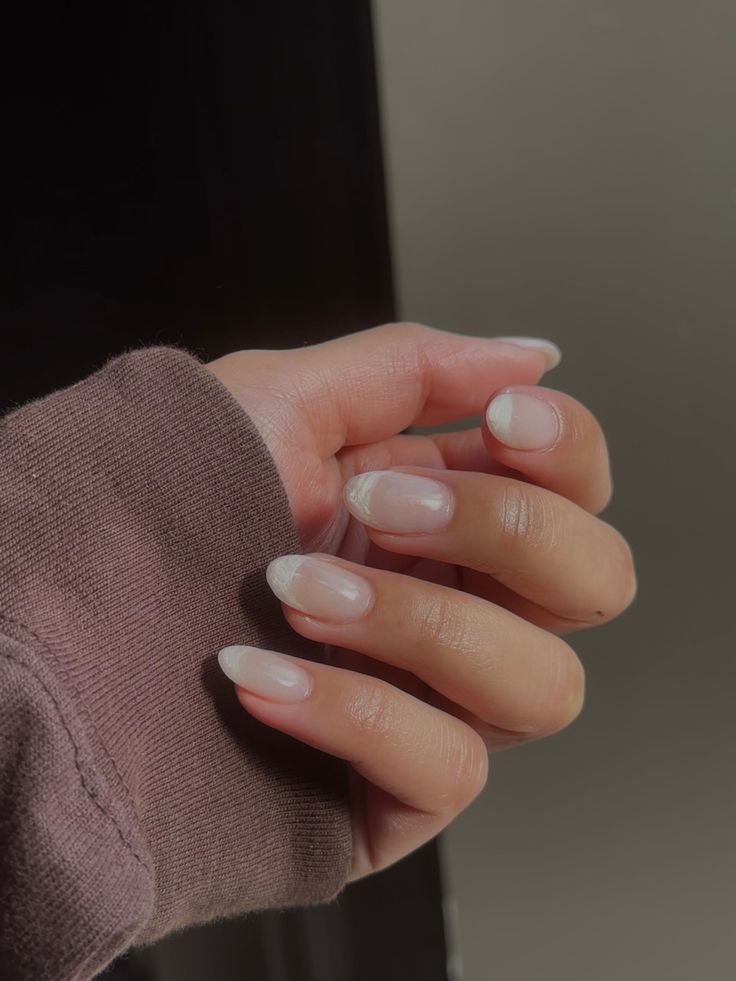 Sophisticated Ombre Nail Design with Subtle White Tips on Sheer Pink Base