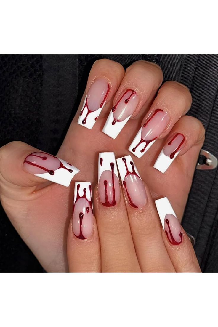 Modern French Manicure: Striking Gradient Pink and Deep Red Drip Accents.