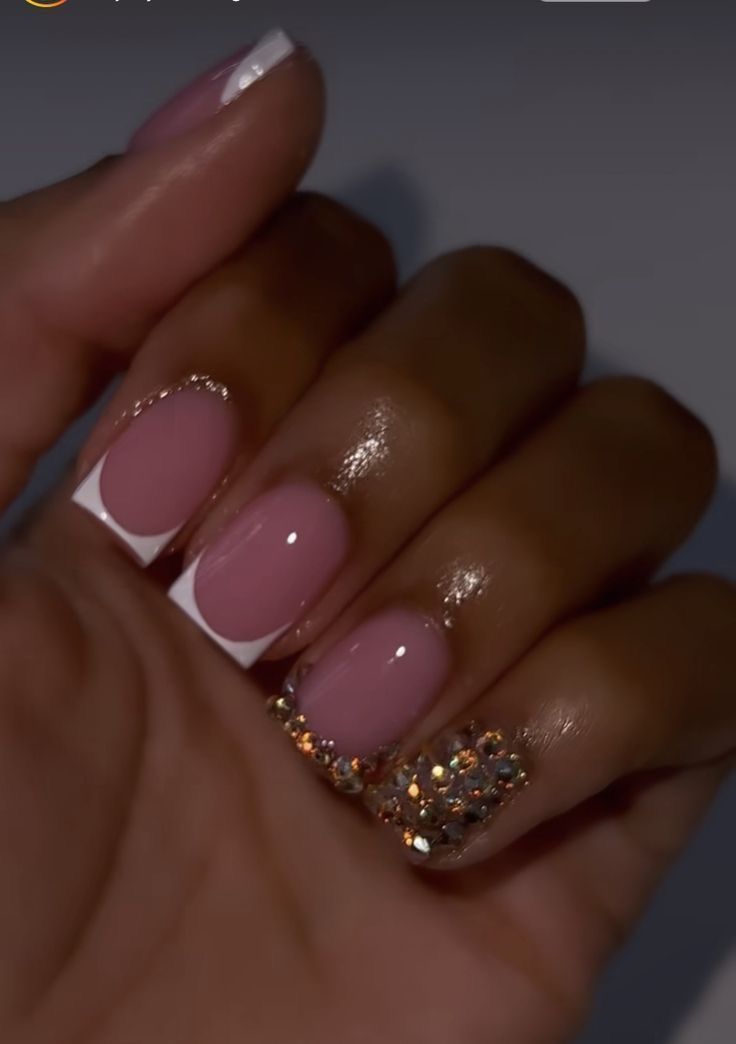 Sophisticated Soft Pink French Tip Nails with Glamorous Rhinestone Accent