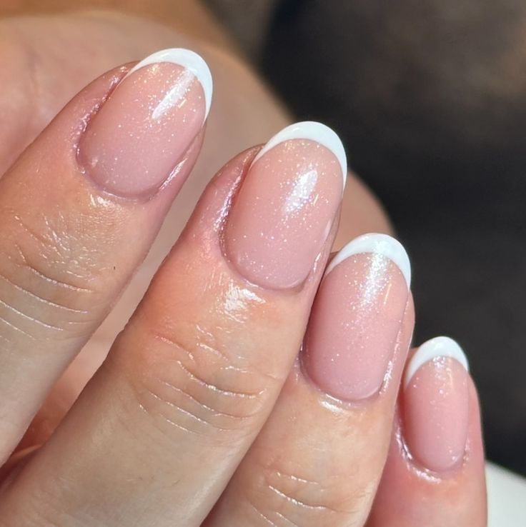 Sophisticated Elegant French Manicure with Soft Pink Base and Glossy White Tips.