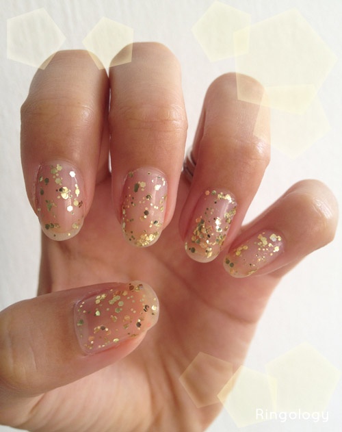 Elegant Nude and Gold Glitter Nail Design with Stunning Gradient Effect