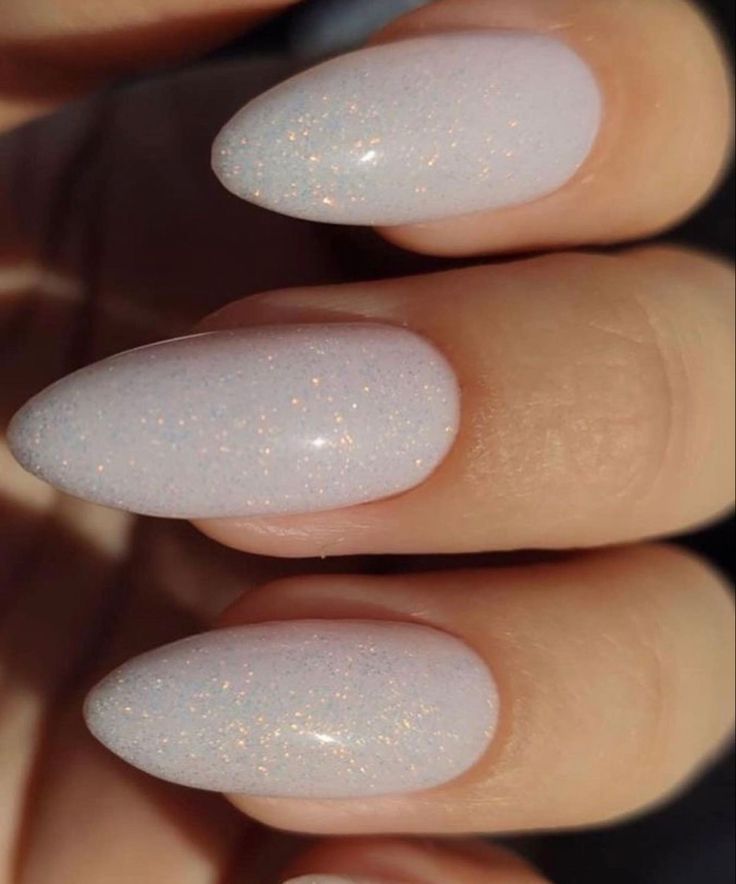 Elegant Sparkling Pastel Nails: Iridescent Finish with Oval Sophistication