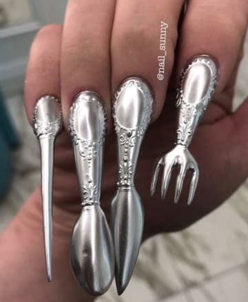 Playful Cutlery-Inspired Nail Art: Unique Utensil Designs with Intricate Details and Metallic Shine.