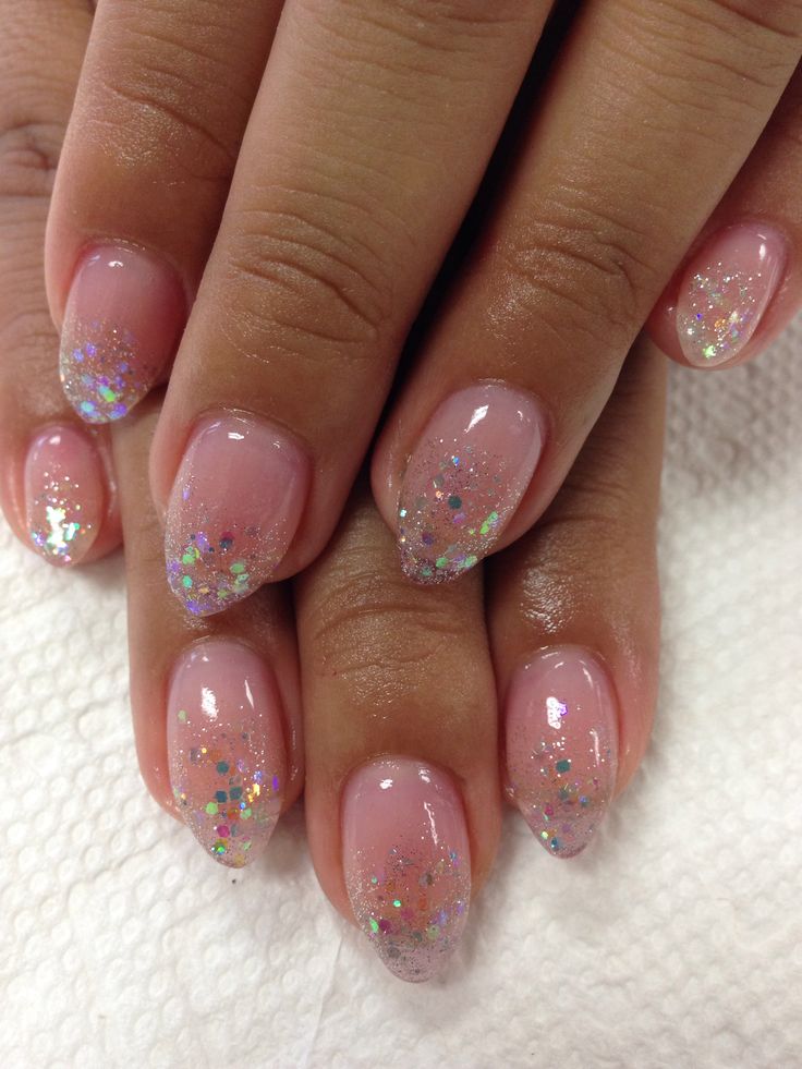 Sophisticated Soft Pink Ombre Nail Design with Sparkling Glitter Tips.