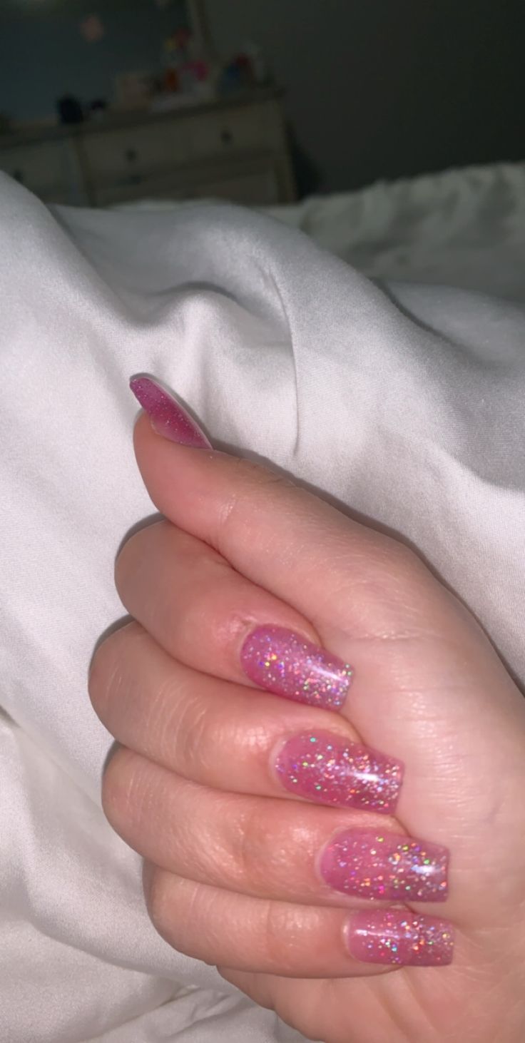 Dazzling Sparkling Pink Nails: A Glamorous Blend of Solid and Glitter Finishes