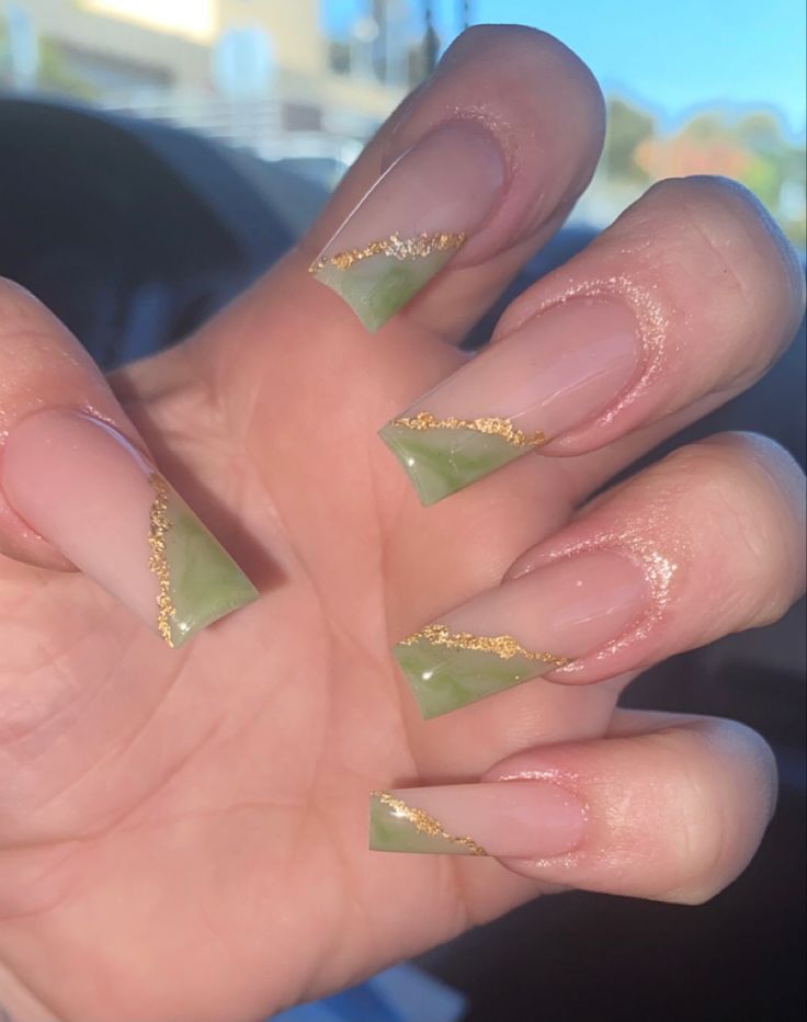 Sophisticated Soft Pink and Green Tip Nail Design with Gold Accents.