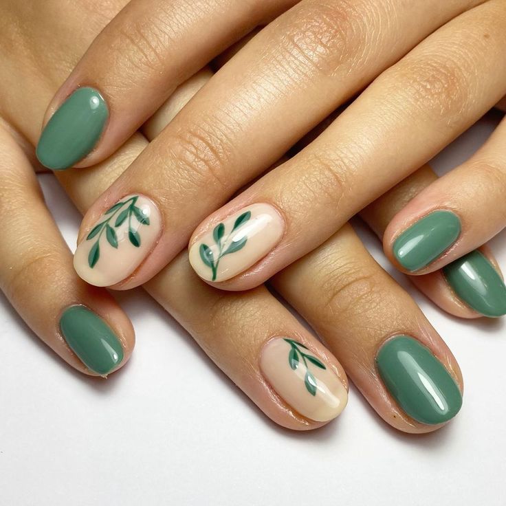 Chic Nature-Inspired Nail Design in Muted Green and Beige Tones.