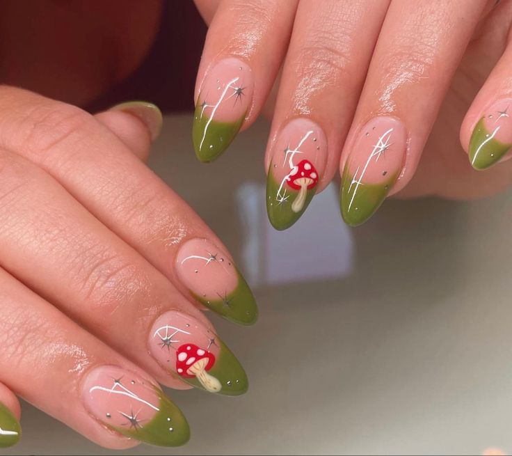 Vibrant Green Gradient Nail Design with Whimsical White Lines and Red Mushroom Accents.