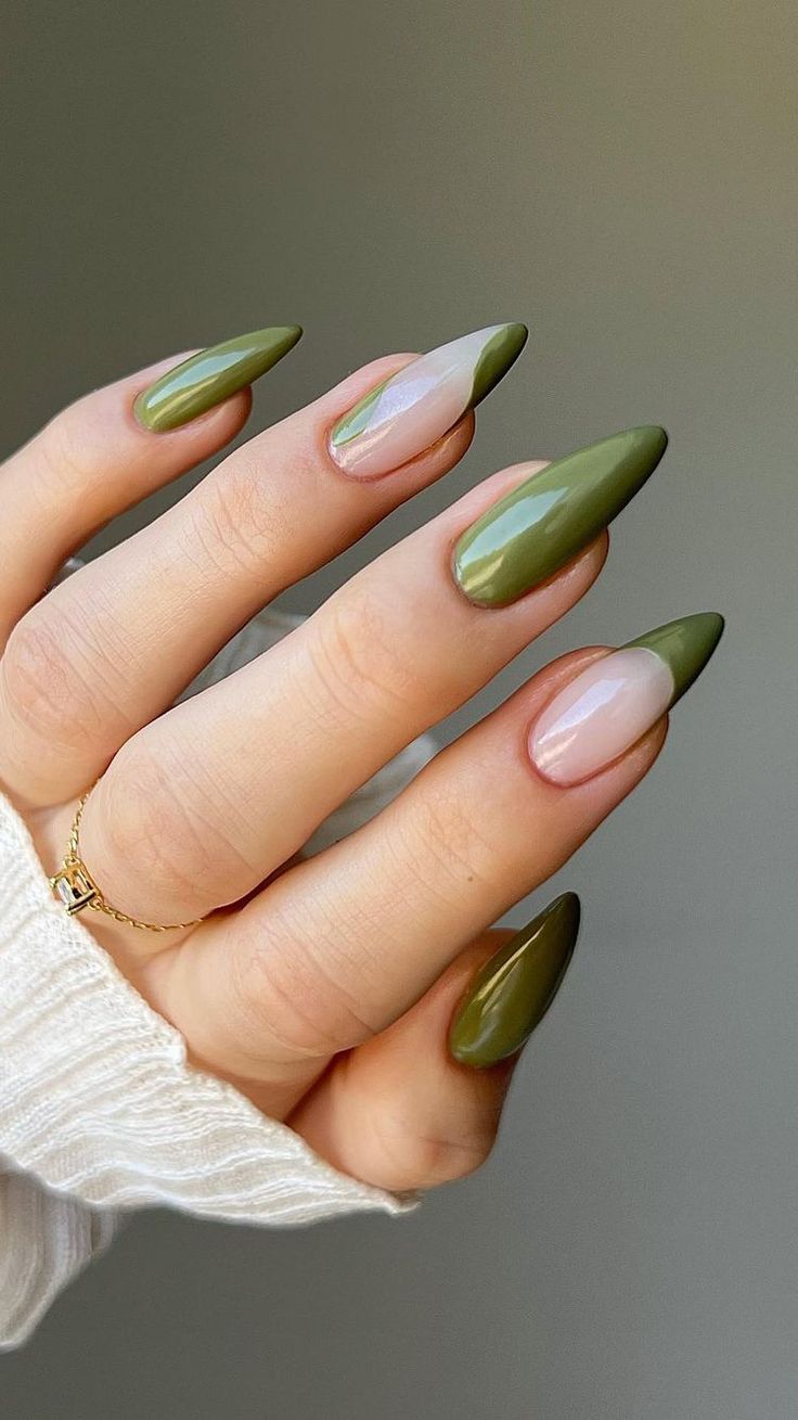 Sophisticated Almond-Shaped Nail Design: Dark Green Polish with Nude Accents.