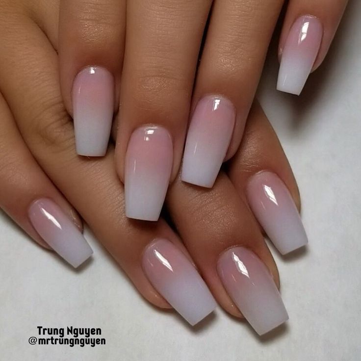 Chic Ombre Nail Design: Smooth Pink to Sheer White Gradient on Square Shaped Nails with Glossy Finish.