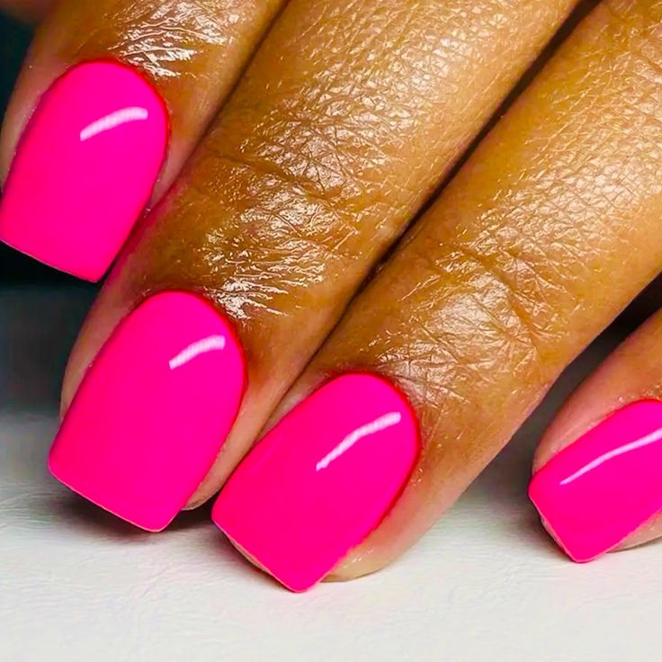 Chic Vibrant Pink Nail Design with Glossy Finish and Square Tips for Bold Statements.