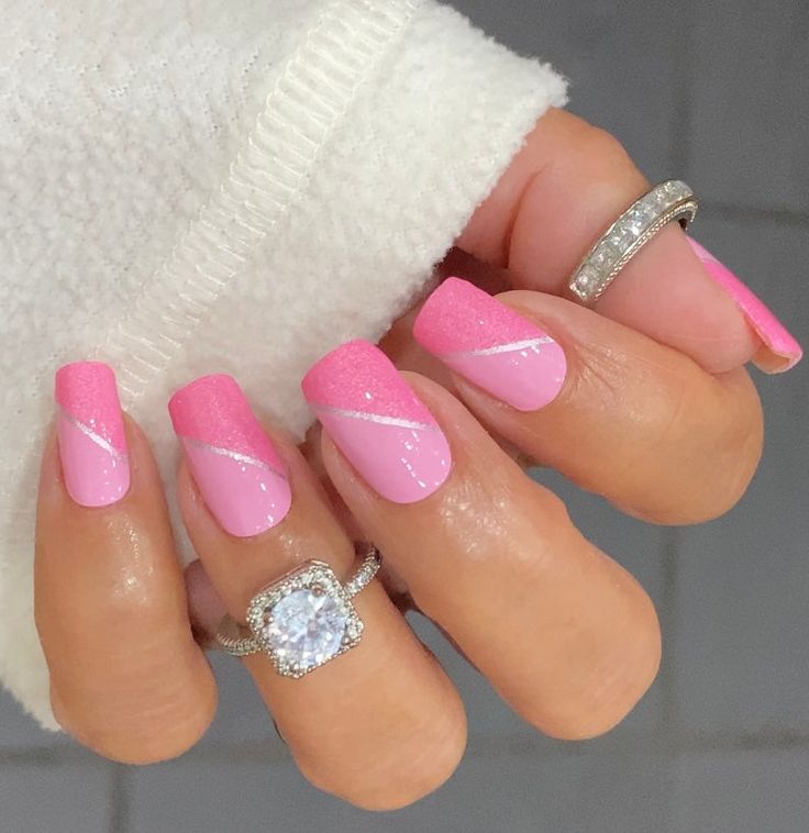 Elegant Gradient Pink Nails with Delicate Lines and Shimmer Accents.