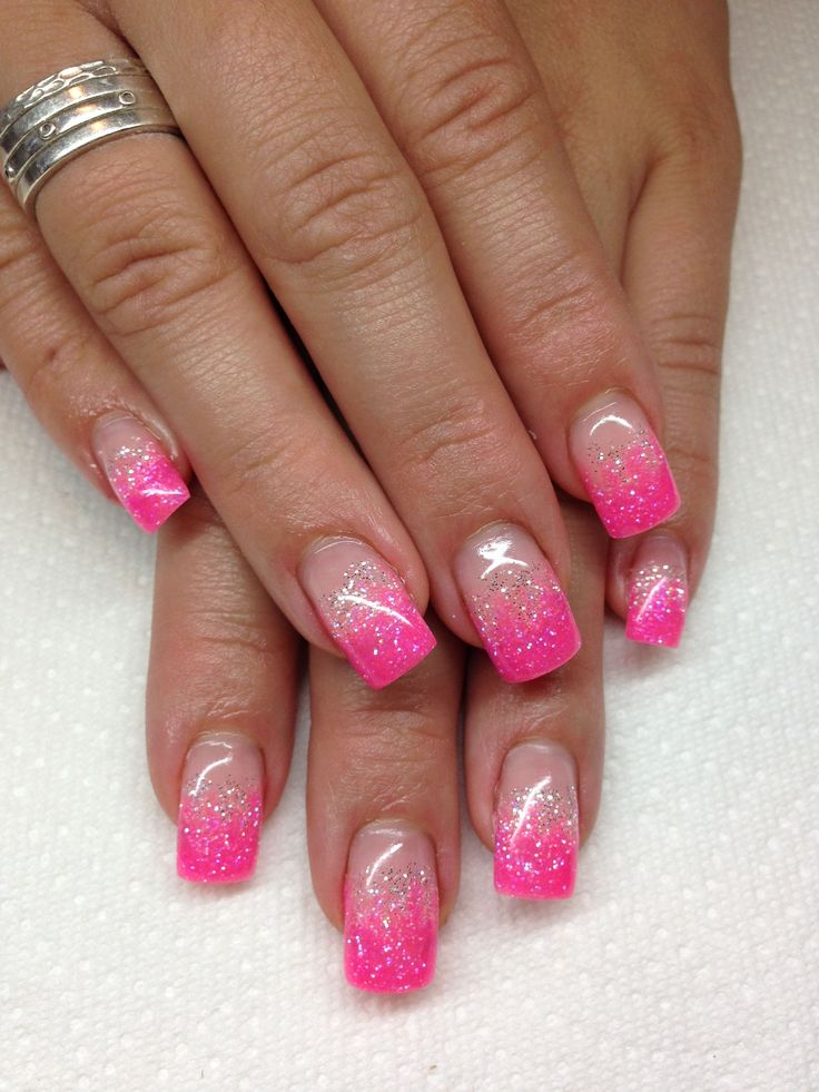 Vibrant Pink Ombre Nail Design with Glittery Glamour.