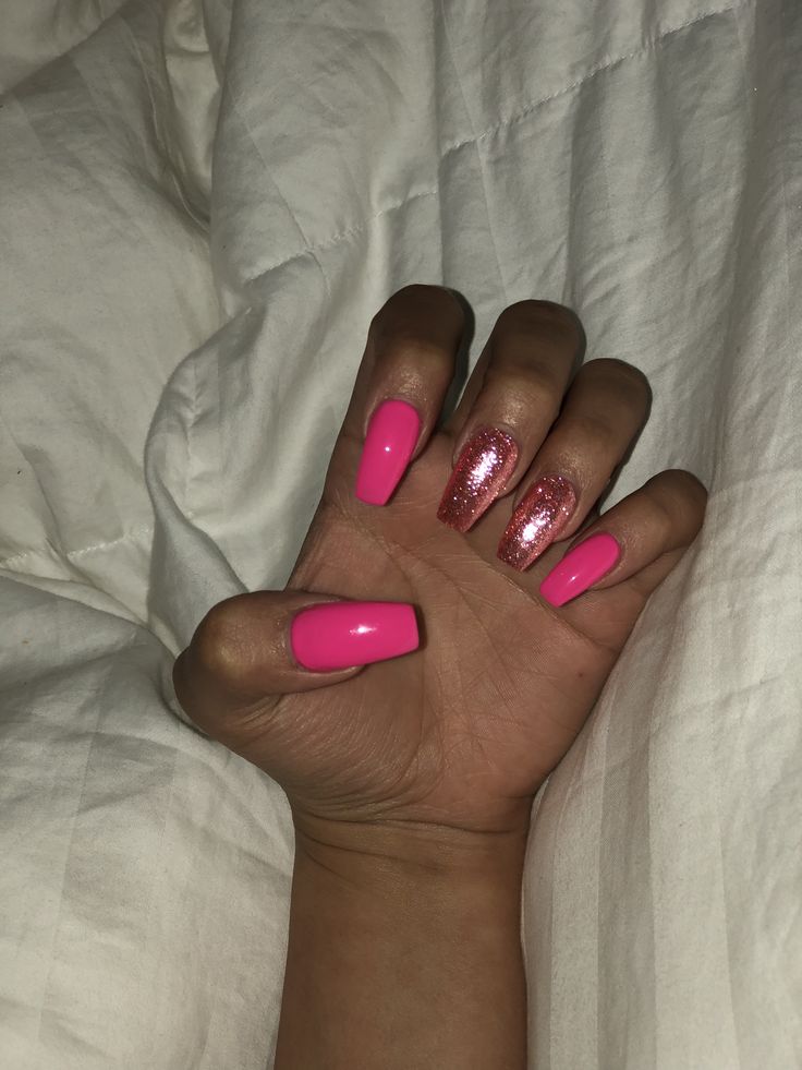 Bold Glitter-Accented Pink Nails for a Playful Manicure Statement