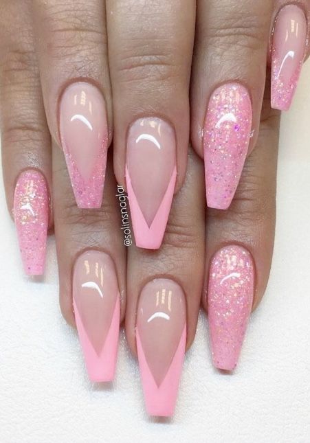 Elegant Almond-Shaped Nail Design: Soft Pink and Nude with Glitter Gradient and Chic V-Tips