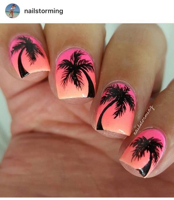 Exotic Tropical Sunset Nail Design with Vibrant Gradient and Bold Palm Tree Silhouettes.