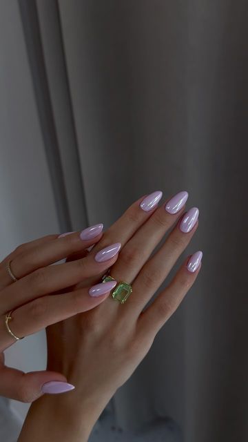 Chic and Polished: Elegant Pastel Pink Almond Nails Enhanced by Jewelry