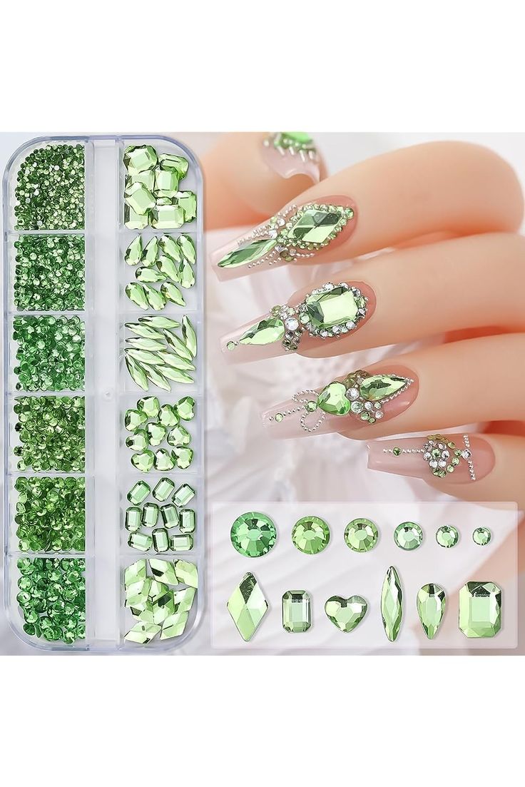 Sophisticated Green Nail Design with Intricate Rhinestones for Glamorous Occasions.