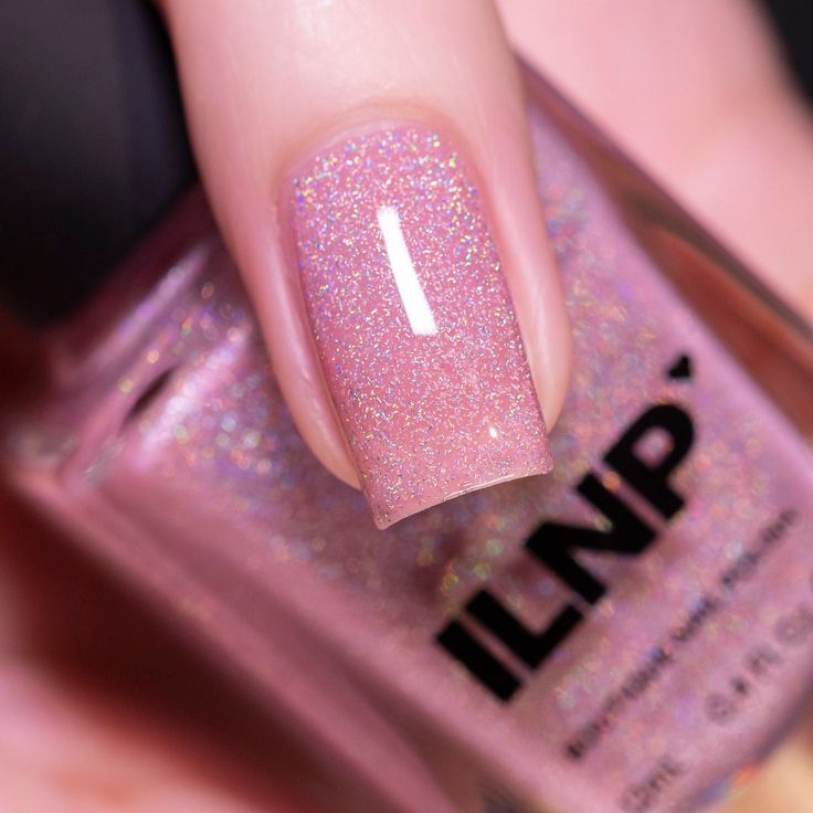 Captivating Holographic Pink Nail Design for Glamorous Accents.