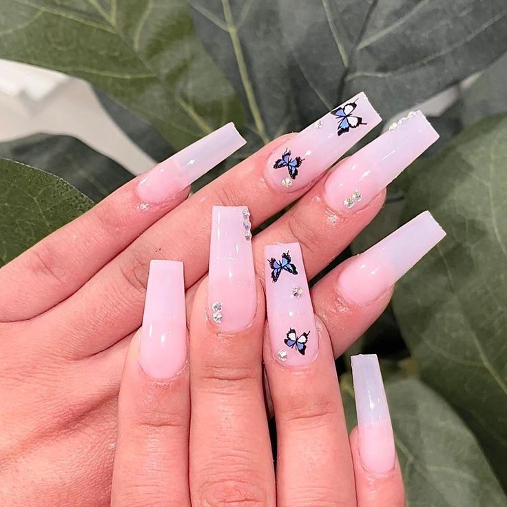 Chic Ombre Nail Design with Butterfly Motifs and Rhinestones