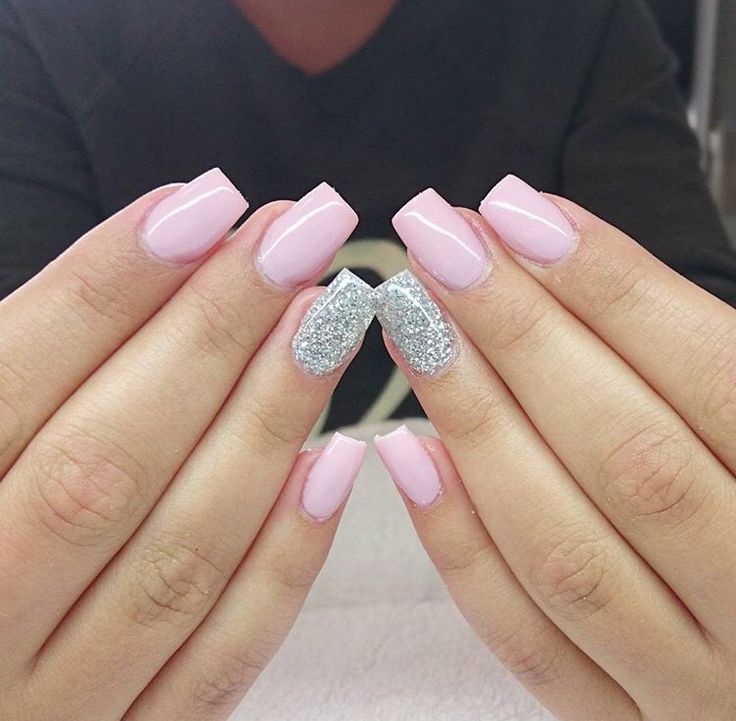 Sophisticated Pink Manicure with Glamorous Glitter Accent Nail.