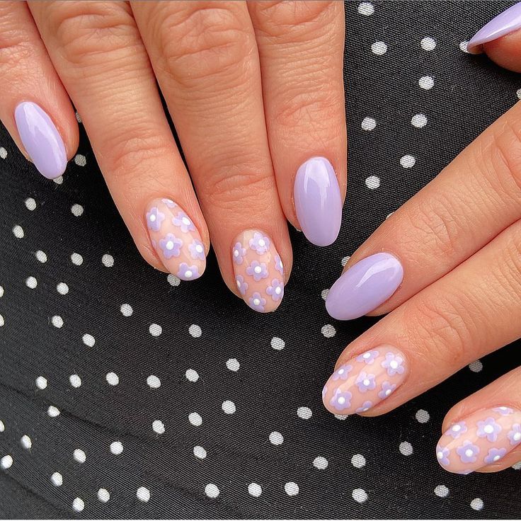 Chic Lavender Nail Design with Glossy Finish and Floral Patterns