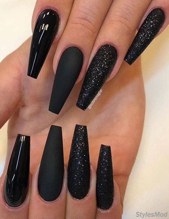 Sophisticated Elegant Black Nail Design with Matte, Glossy, and Glittery Accents.