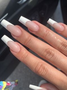 Chic Long Acrylic French Manicure with Contemporary Negative Space Accents.