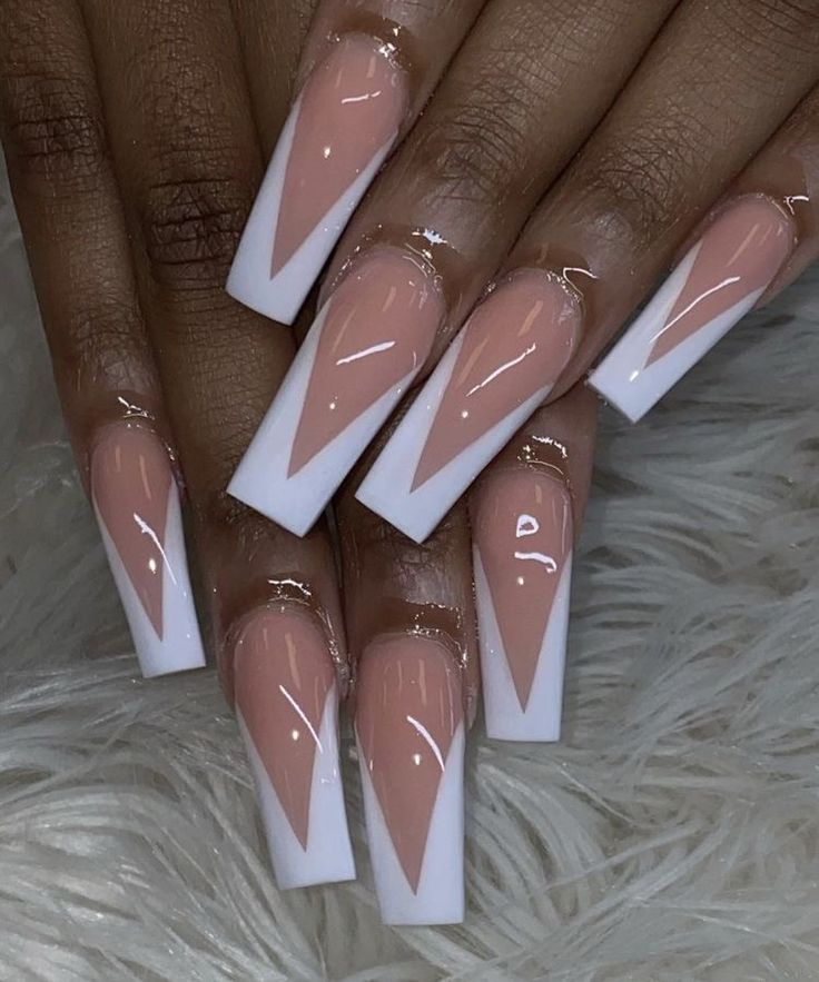 Chic Nude and White Geometric Nail Design with High-Gloss Finish.