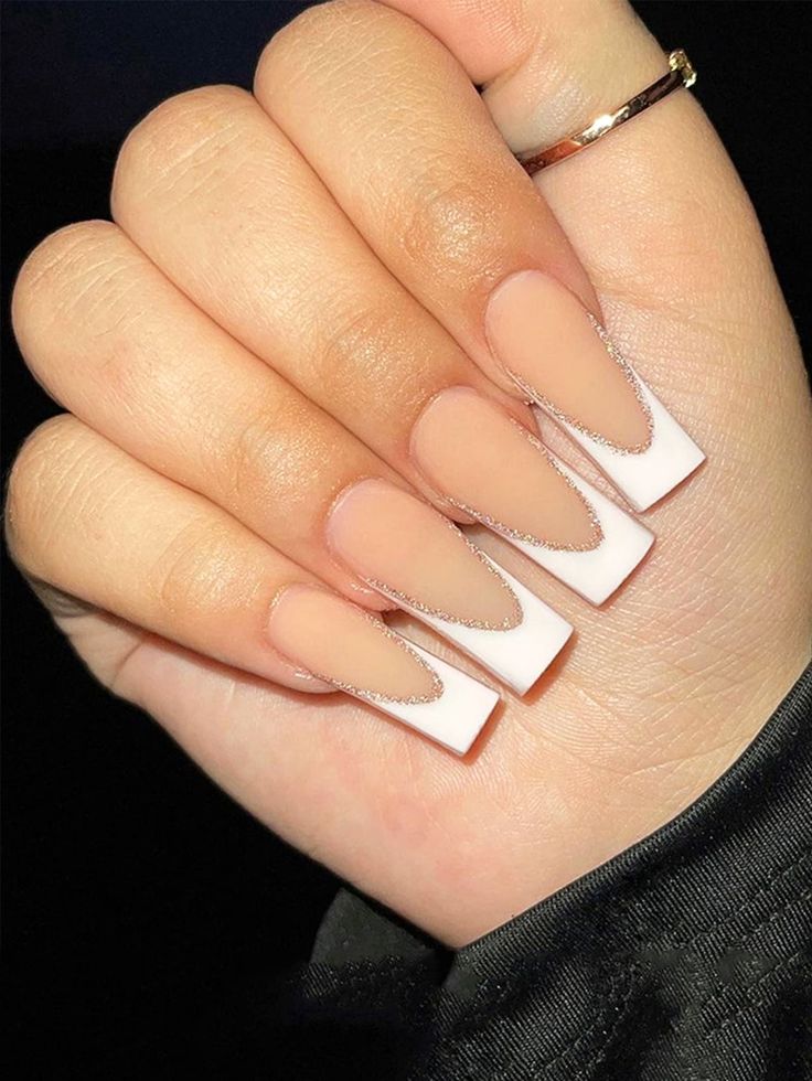 Sophisticated Long Square-Tipped Nude Nails with White Tips and Silver Detailing.