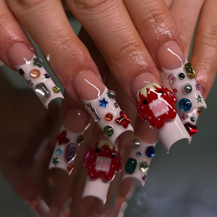 Whimsical Vibrant Nail Design with Glossy White Base and Playful Strawberry Embellishments