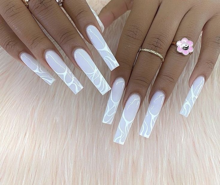 Elegant Chic: Stylish Long Nails with Soft White and Clear Artistic Designs