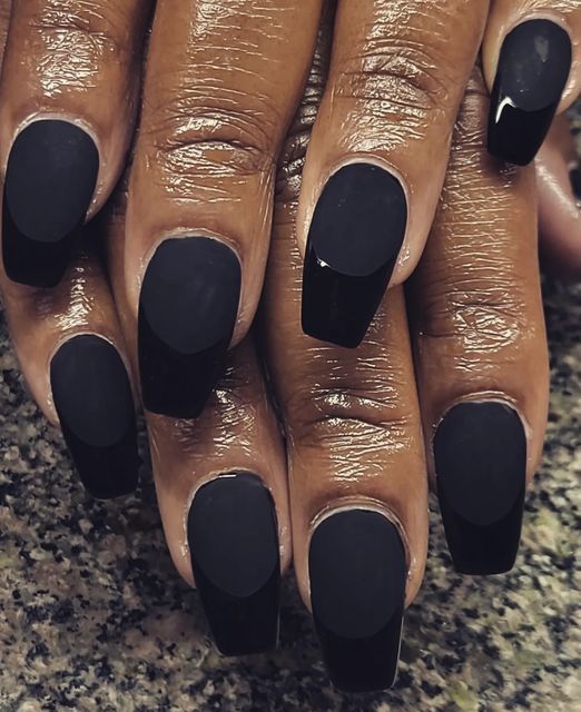 Elegant Matte Black and Glossy Accent Nail Design for Bold Statements.