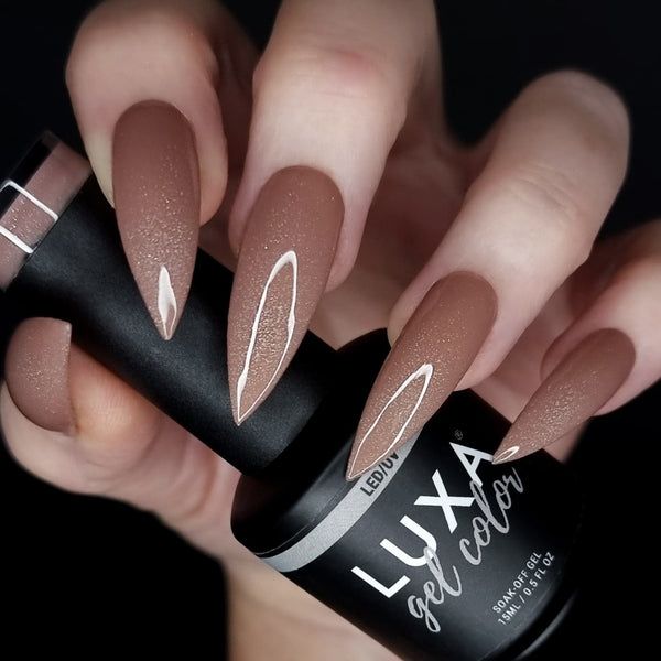 Chic Matte Brown Nails with Edgy Design and Subtle Shimmer.