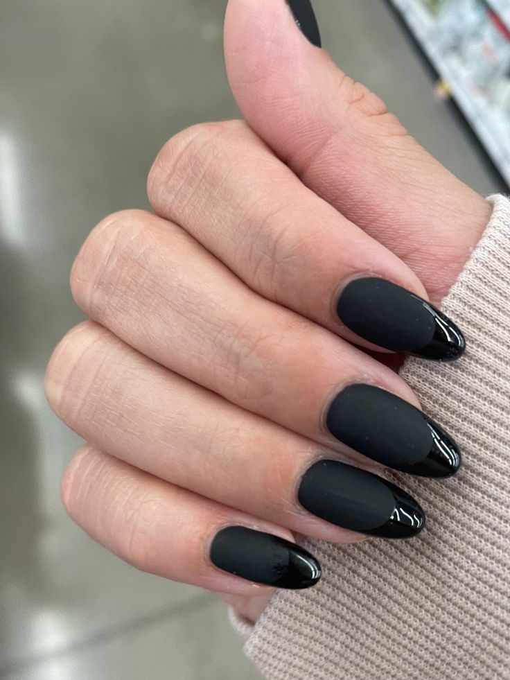 Chic Black Matte Nails with Glossy Tips: A Modern Minimalist Design for Any Occasion.