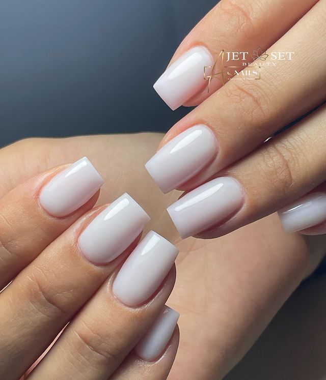 Timeless Elegance: Sleek Soft White Nails with a Modern Squared Shape