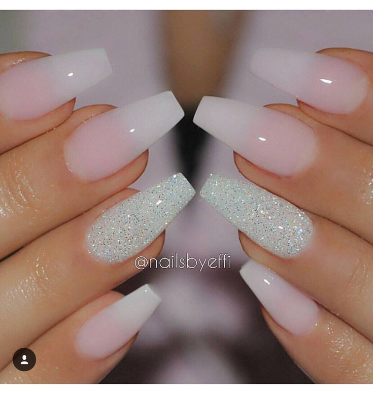 Chic Pastel Pink Nail Design with Glitter Accents and Gradient Finish.