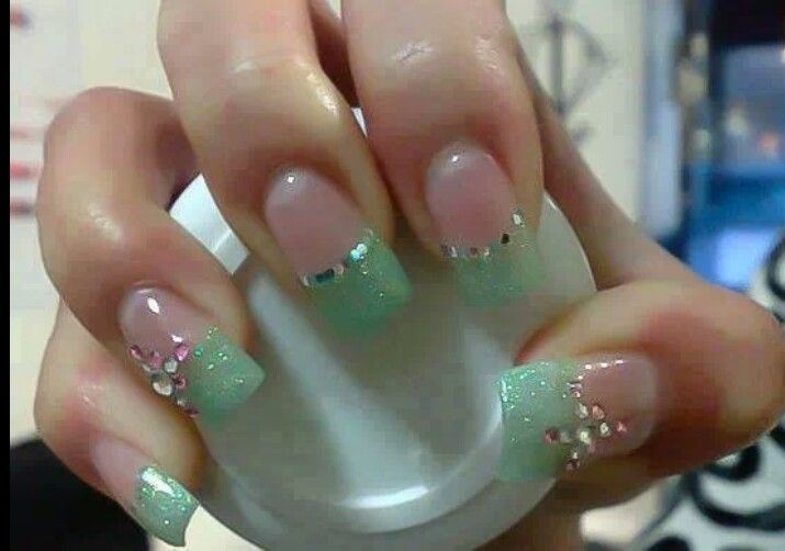 Chic Mint Green Ombre Nails with Sparkling Rhinestone Accents.