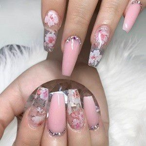 Elegant Floral Nail Design with Pink Roses and Rhinestones on a Translucent Background.