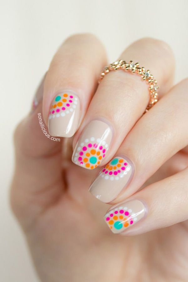 Whimsical Nude Nail Design with Colorful Dot Patterns for Every Occasion