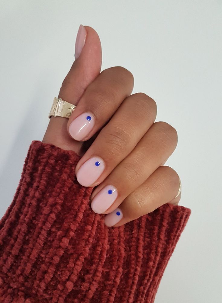 Versatile Chic Nail Design: Soft Nude Base with Playful Blue Dots