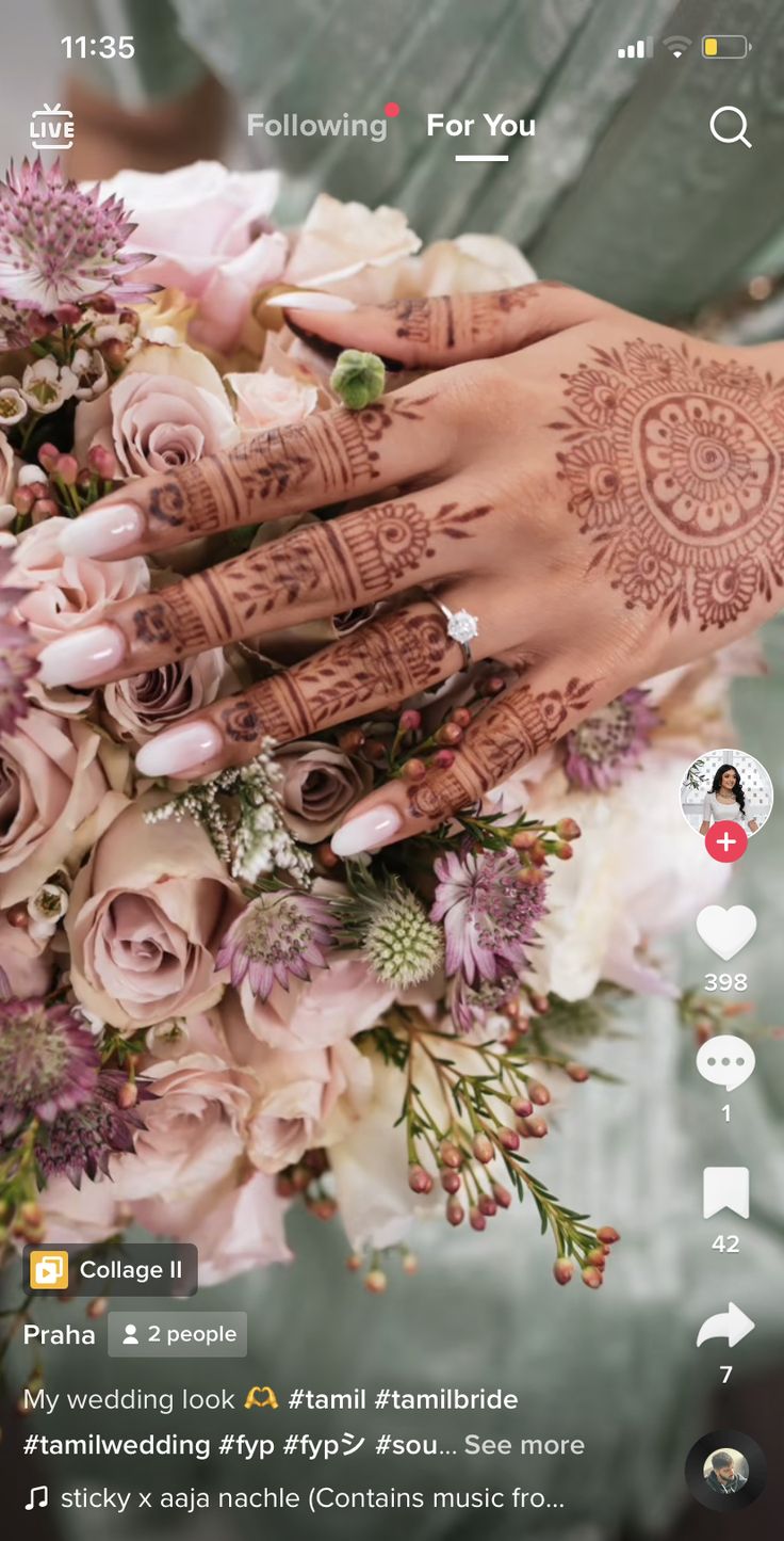 Sophisticated Bridal Nail Design: Soft Pink Polish Meets Intricate Henna Patterns