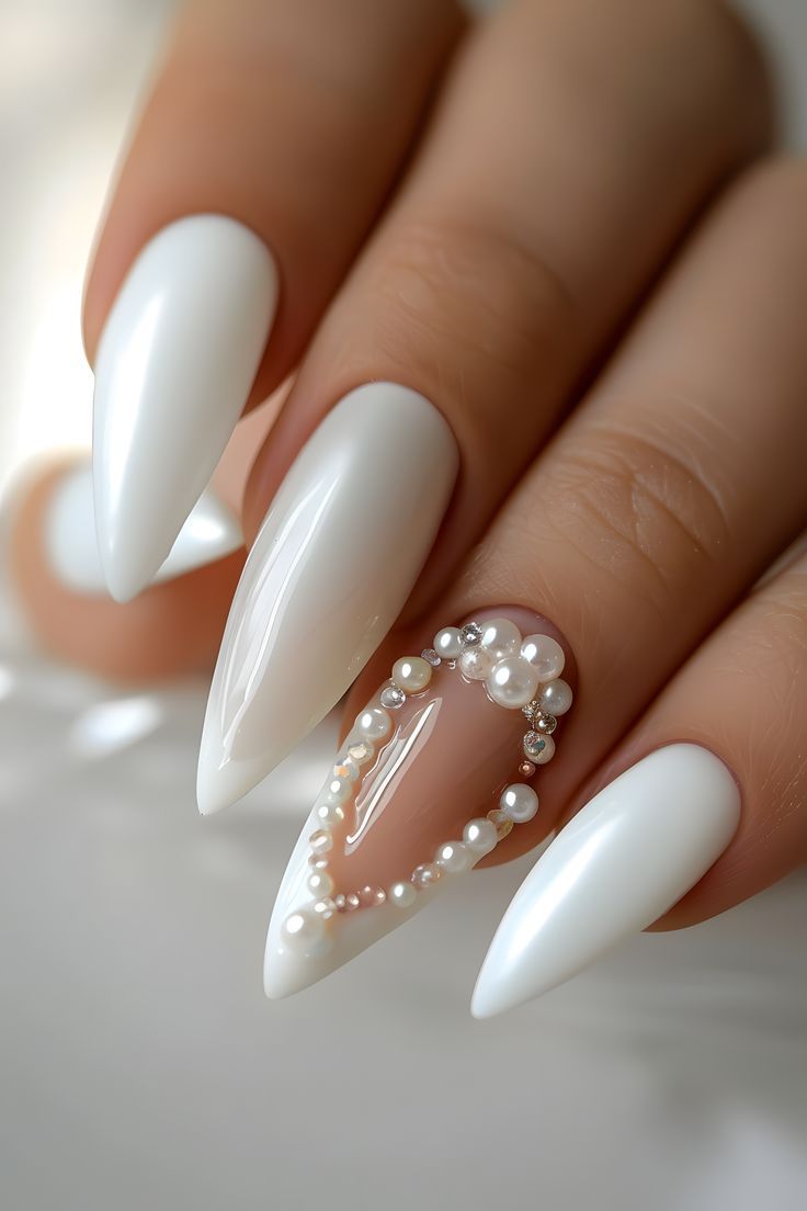 Sophisticated Almond-Shaped Nails: Glossy White Finish with Luxe Pearl and Rhinestone Accent.