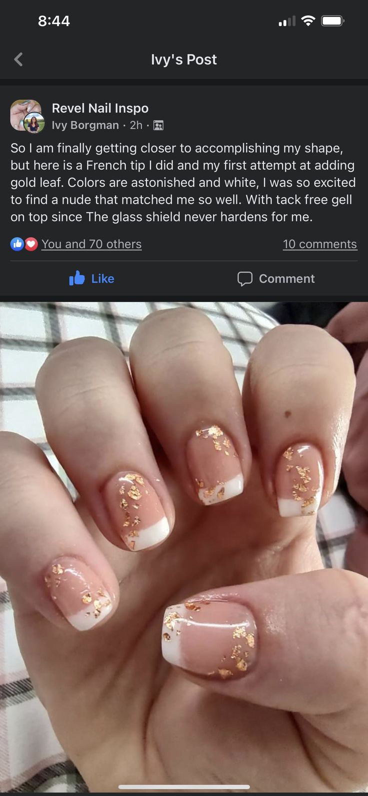 Elegant French Tip Nail Design with Glittering Gold Flakes