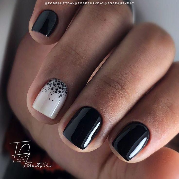 Chic Black and White Nail Design with Gradient Accent and Dot Detailing