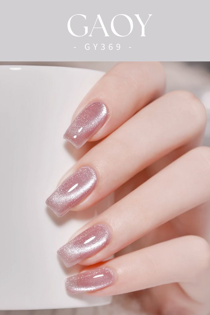 Chic Soft Pink Gradient Nail Design with Subtle Shimmer.